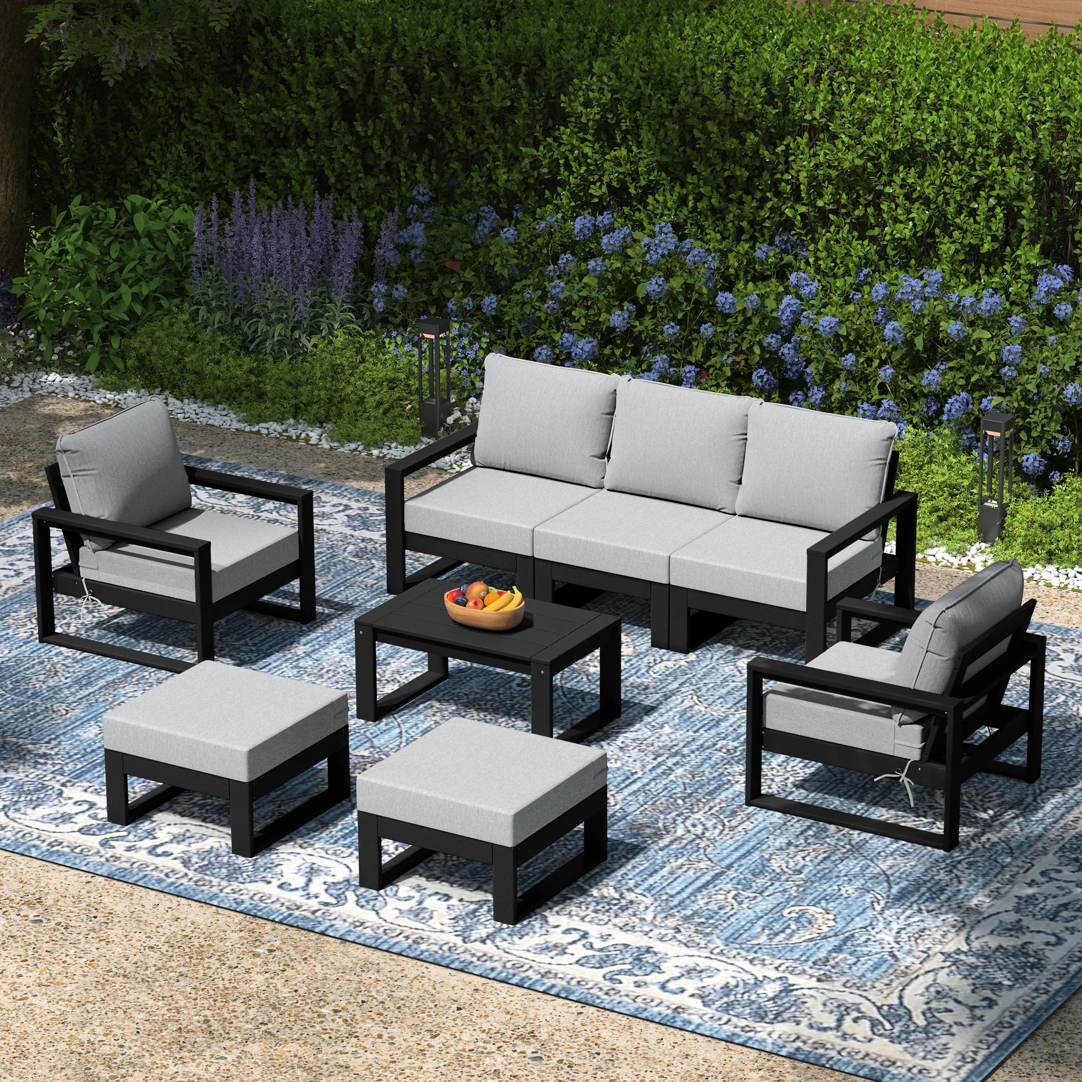 Rockaway 8-Piece Modern HDPE Outdoor Patio Furniture Conversation Set with Coffee Table and Ottomans