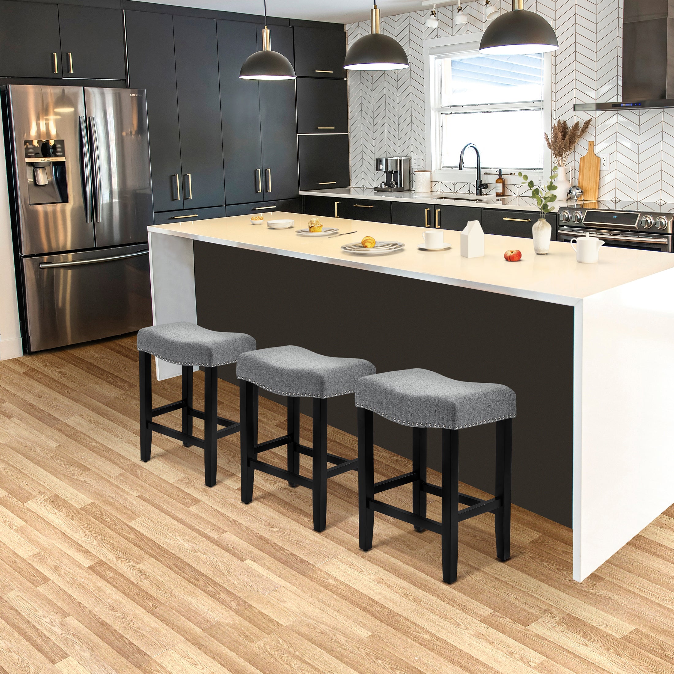 Bulmon 24" Upholstered Saddle Seat Black Counter Stool (Set of 3)